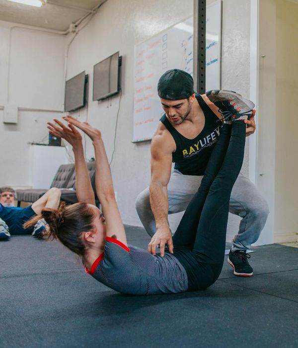 Person doing a stretching exercise to improve flexibility.